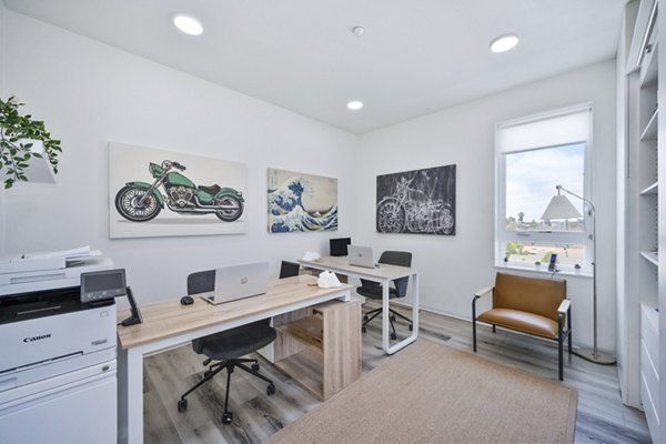 Home office with modern decor and ergonomic furniture at 2911 Adams Apartments