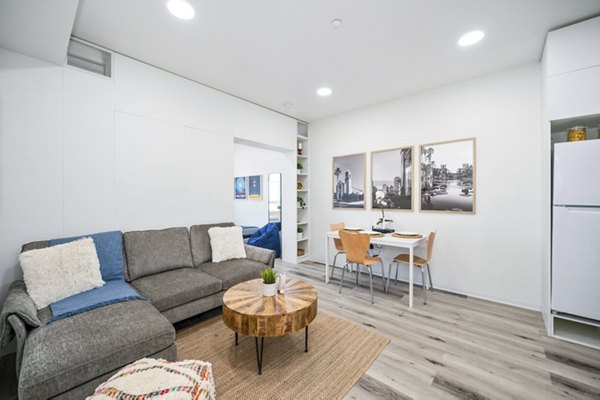 Elegant dining and living room with contemporary decor at 2911 Adams Apartments