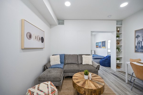 Spacious living room with modern furnishings at 2911 Adams Apartments, Greystar luxury apartments in a premium location