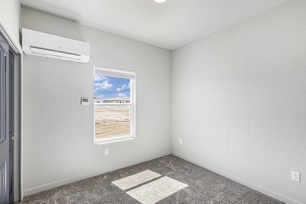 bedroom at The Cottages at Woodmen Heights Apartments