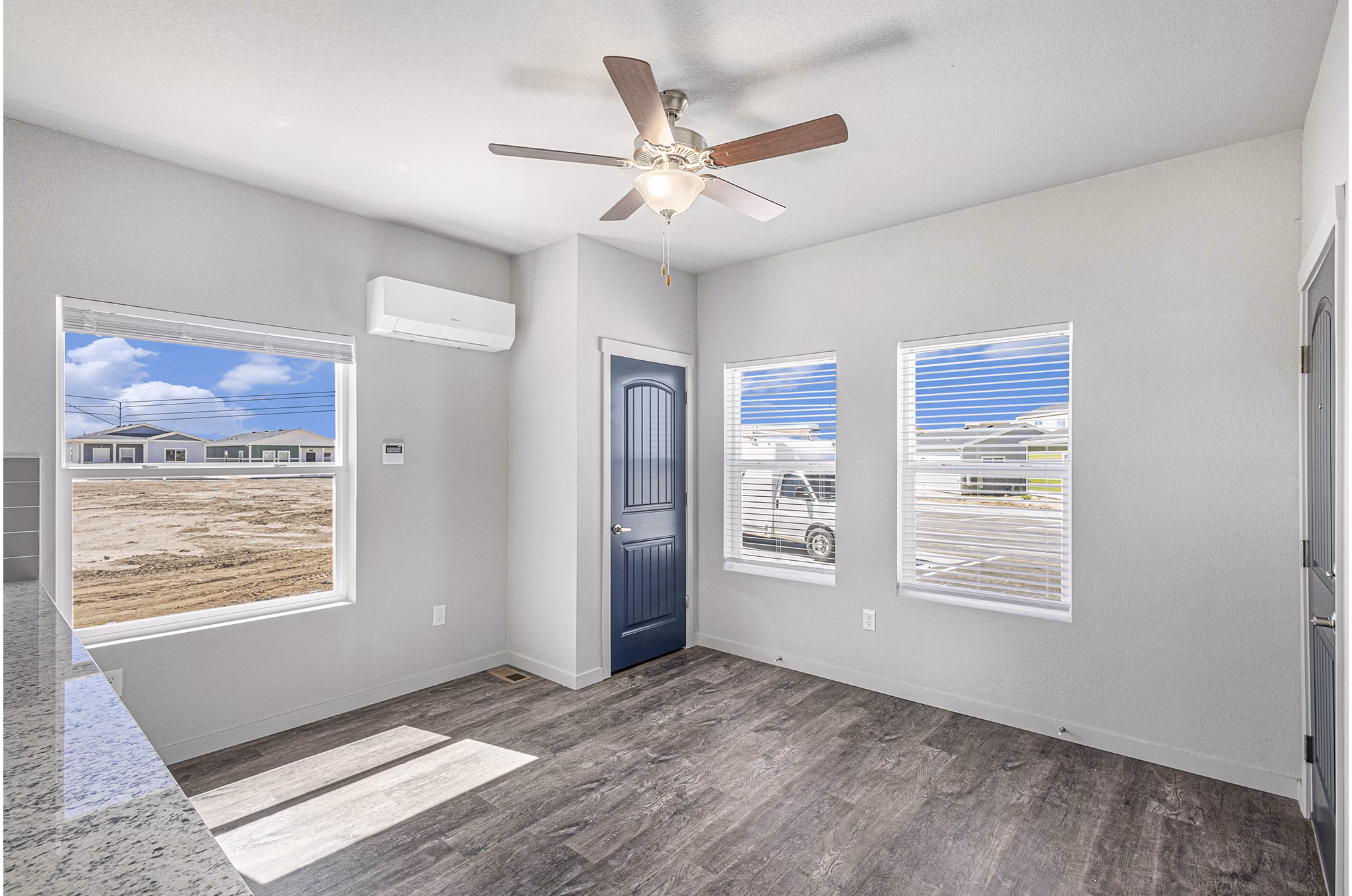 living room at The Cottages at Woodmen Heights Apartments