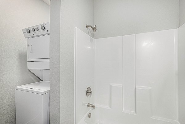 laundry and bathroom at The Cottages at Woodmen Heights Apartments