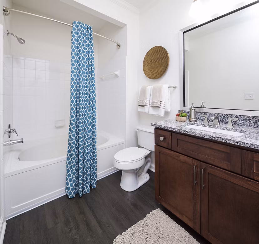 Spa-inspired bathroom featuring a sleek vanity and rainfall shower in Avana Portico Apartments Ideal for modern luxury living