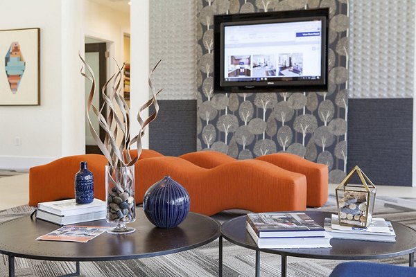 Elegant clubhouse with modern seating at Avana Portico Apartments, perfect for social gatherings and community events