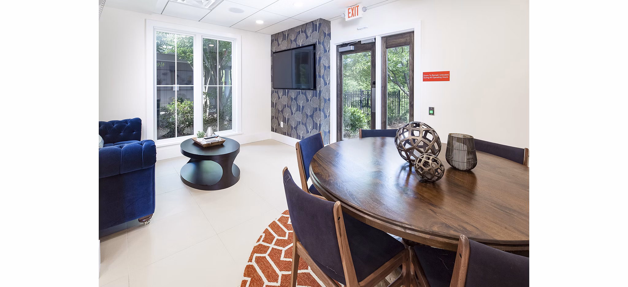 Dining area with modern furnishings at Avana Portico Apartments, featuring a stylish ambiance perfect for entertaining guests and relaxed dining