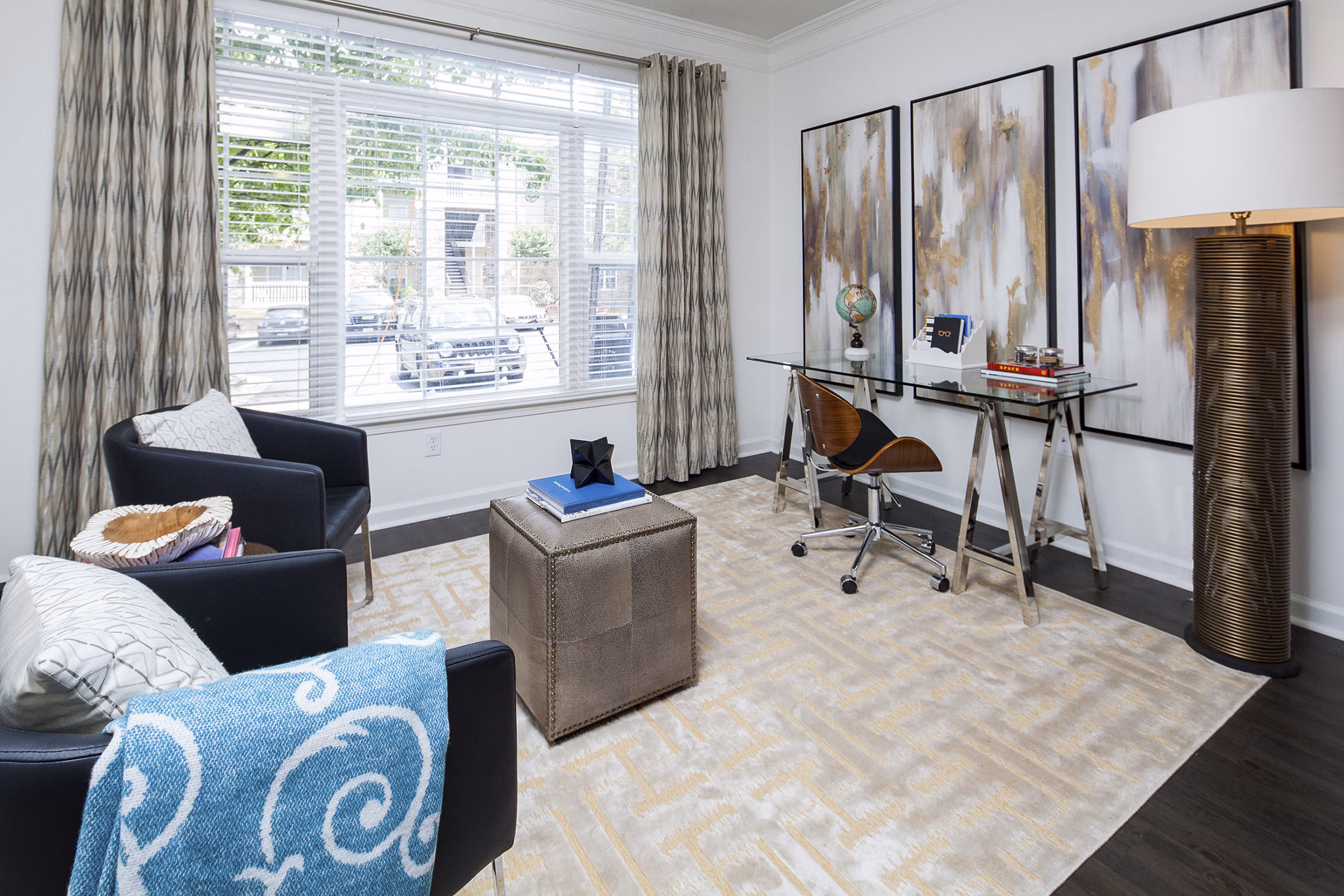 Home office with modern decor and ample natural light at Avana Portico Apartments, ideal for remote workspaces