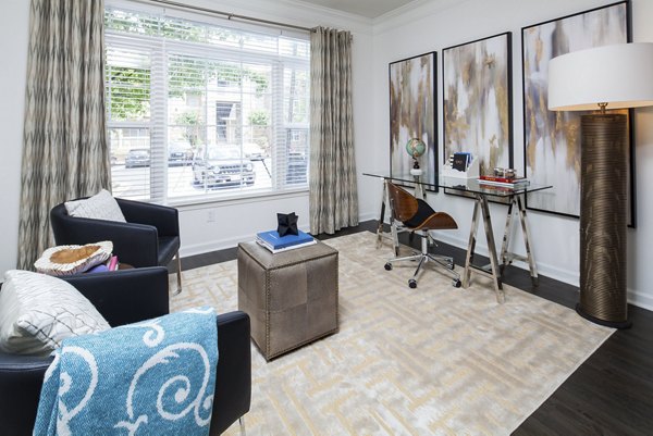 Home office with modern decor and ample natural light at Avana Portico Apartments, ideal for remote workspaces