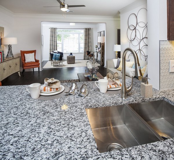 Modern kitchen with stainless steel appliances at Avana Portico Apartments