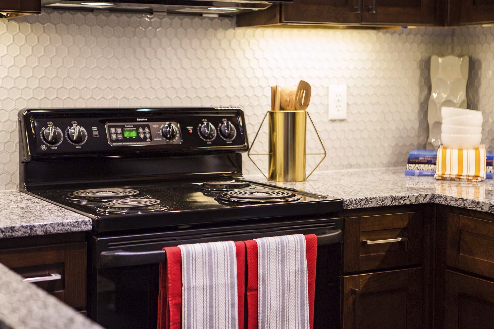 Sleek kitchen with stainless steel appliances in Avana Portico Apartments