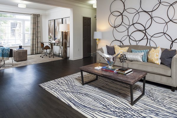 Modern living room with stylish decor in Avana Portico Apartments featuring luxury amenities