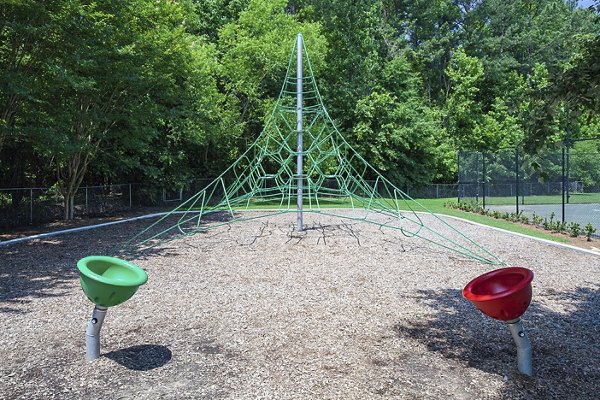 Playground at Avana Portico Apartments featuring modern equipment and safe play areas for children