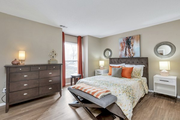 Cozy bedroom with elegant decor at Avana Matthews Apartments, part of Greystar luxury apartments collection