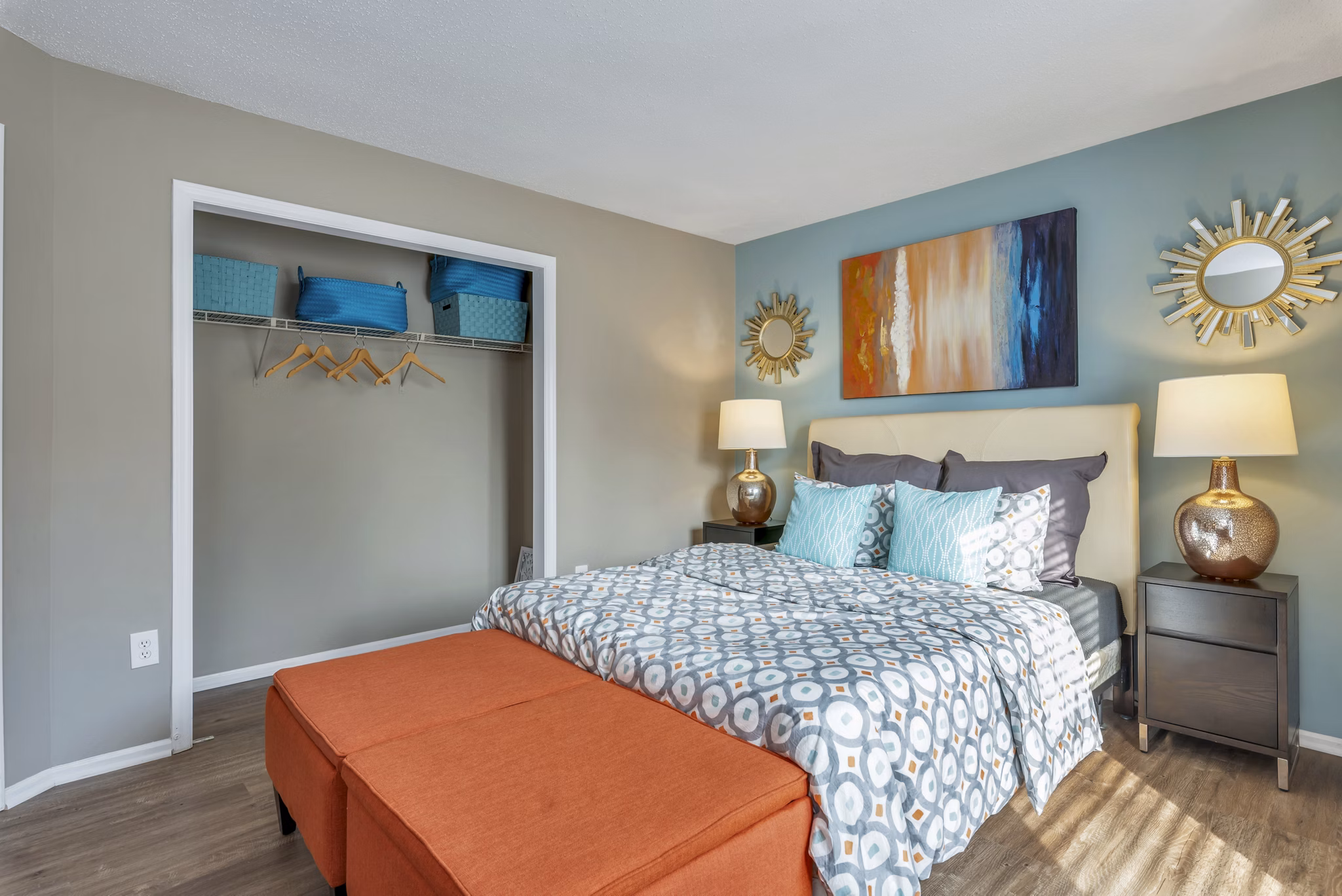 Stylish bedroom with modern decor and large window at Avana Matthews Apartments
