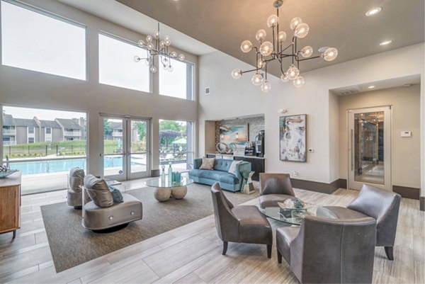 Clubhouse at Avana Matthews Apartments: Modern recreation area with pool tables and seating in Charlotte luxury apartments