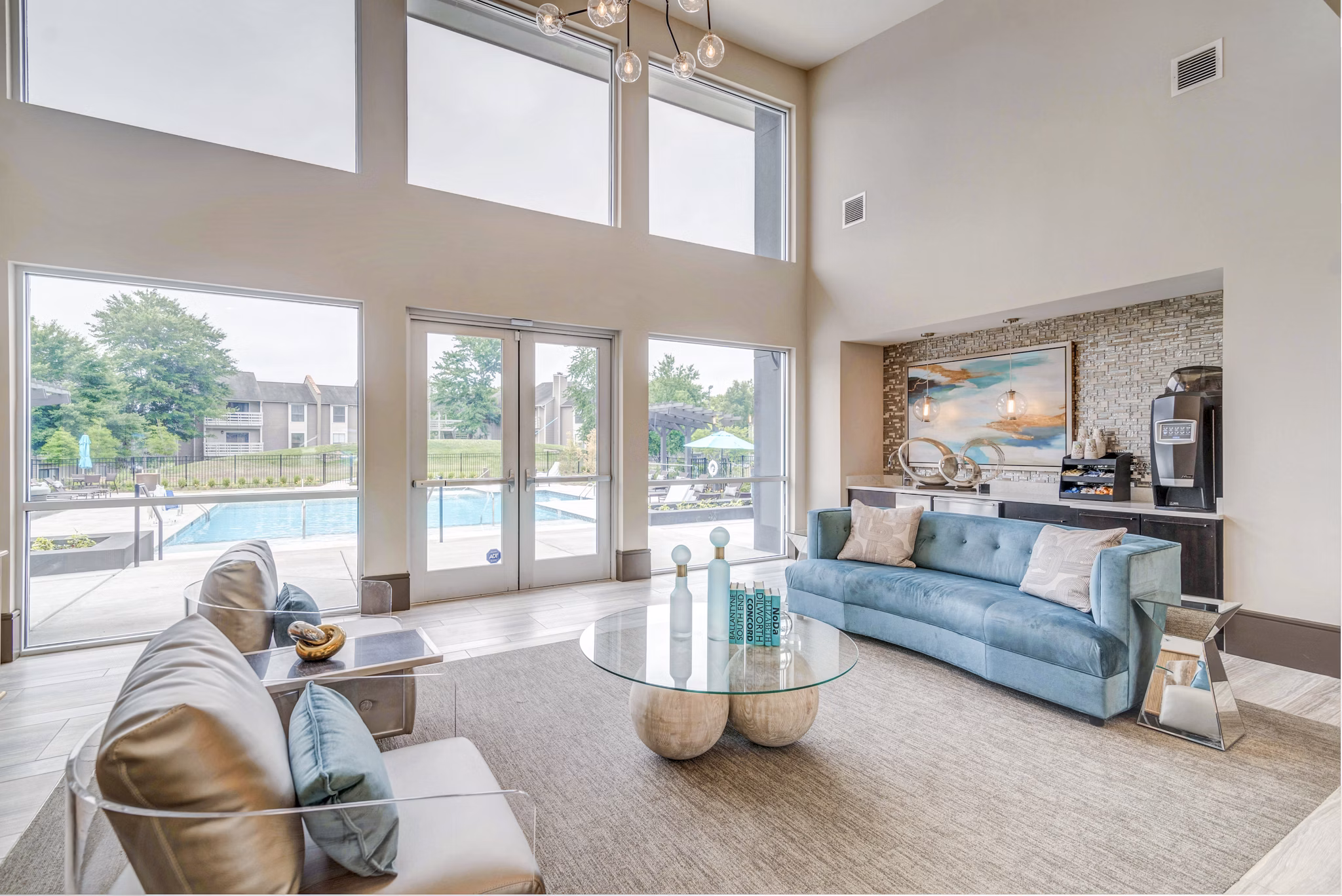 Clubhouse with modern design and seating at Avana Matthews Apartments, luxury living option in a vibrant community setting