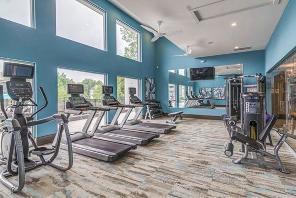 Fitness center with modern gym equipment at Avana Matthews Apartments
