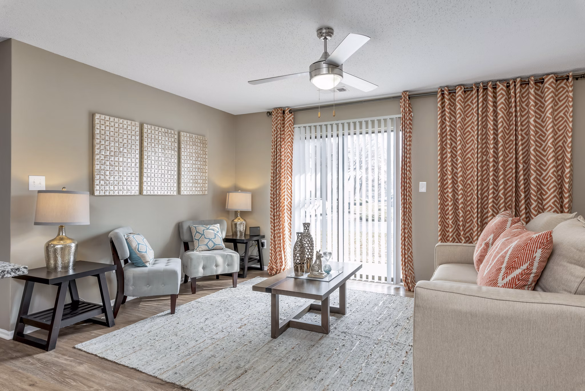 Spacious living room with modern decor and hardwood floors at Avana Matthews Apartments Perfect for hosting or relaxing in luxury