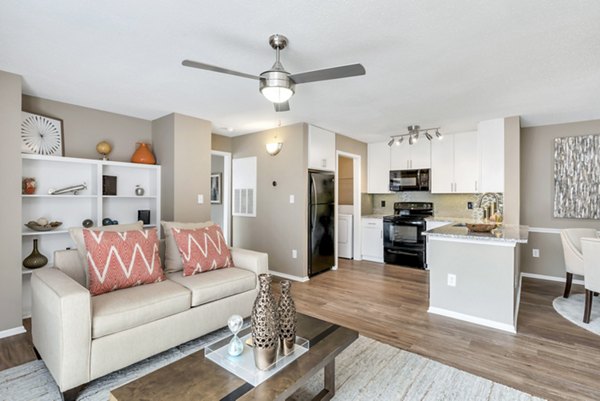 Spacious living room with modern decor and natural light at Avana Matthews Apartments â€“ perfect for luxury living