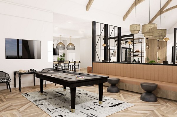Clubhouse with modern design and cozy seating at Alta Harris Farms Apartments