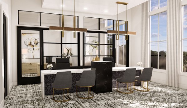 Stylish clubhouse with modern furnishings at Alta Harris Farms Apartments, featuring luxurious amenities for social gatherings and events