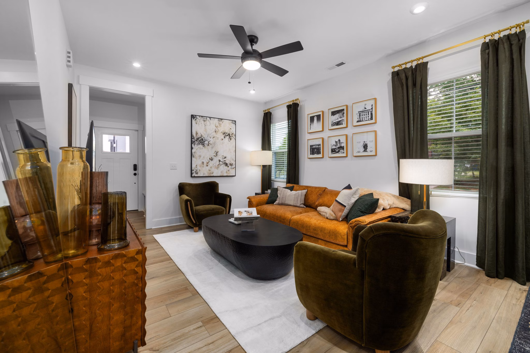 Comfortable living room with modern decor at ABODE at Hargett Apartments