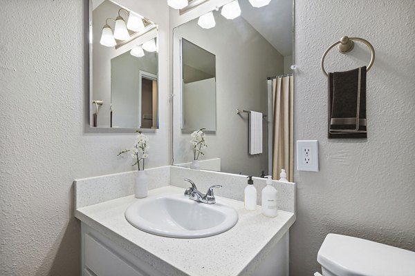 Modern bathroom with sleek fixtures at Coronado Palms Apartments