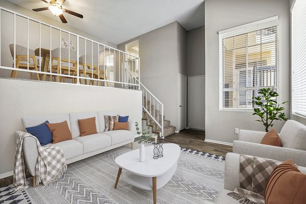 Entrance and living room featuring modern design at Coronado Palms Apartments, a Greystar community in Anaheim, CA.