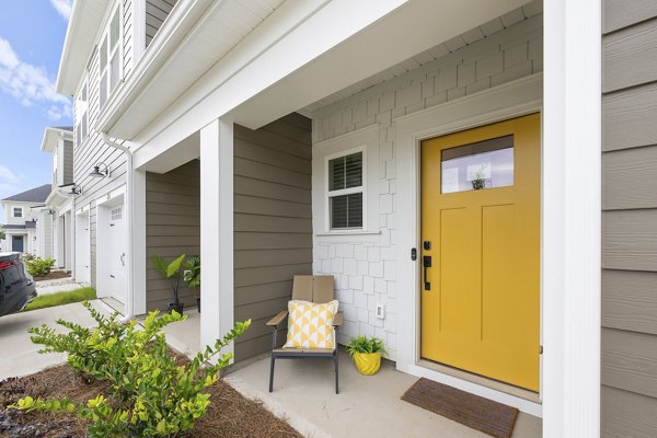 Oak Lake Townhomes: Charming view of luxury townhomes in serene neighborhood