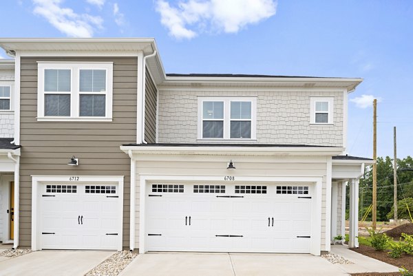 Oak Lake Townhomes: Elegant view of luxury apartments in serene suburban setting