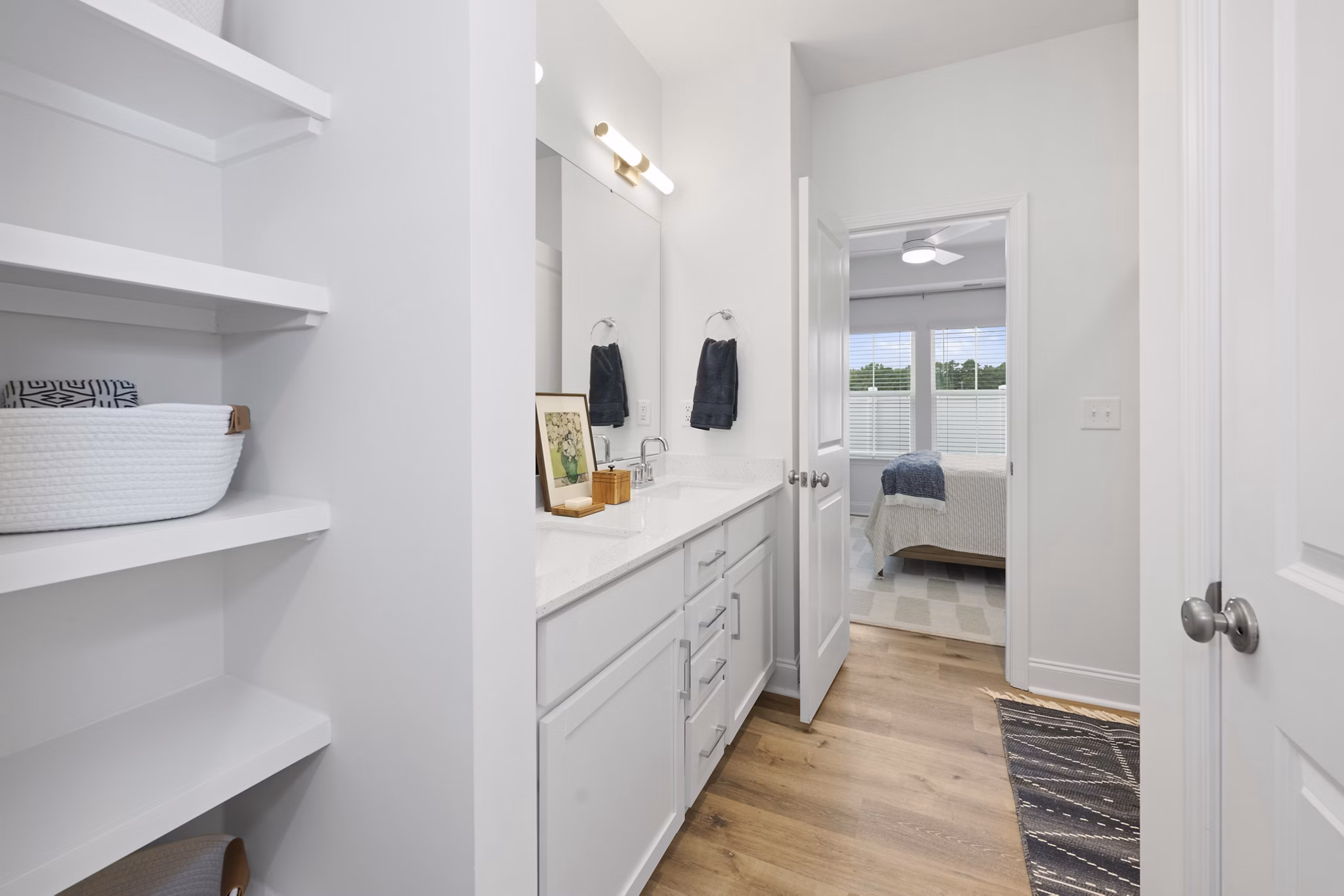 Oak Lake Townhomes: Modern bathroom with sleek fixtures and ample storage