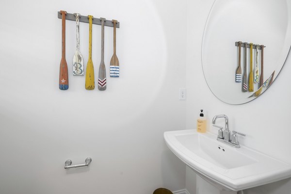 Modern bathroom with sleek fixtures at Oak Lake Townhomes Apartments, enhancing the luxury living experience