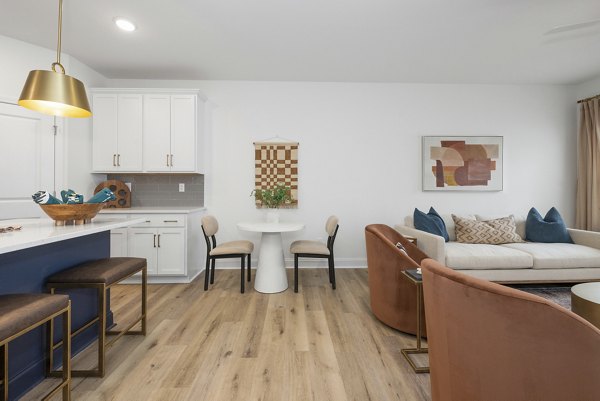 Oak Lake Townhomes Apartments: Elegant clubhouse featuring modern design elements in a welcoming environment for residents