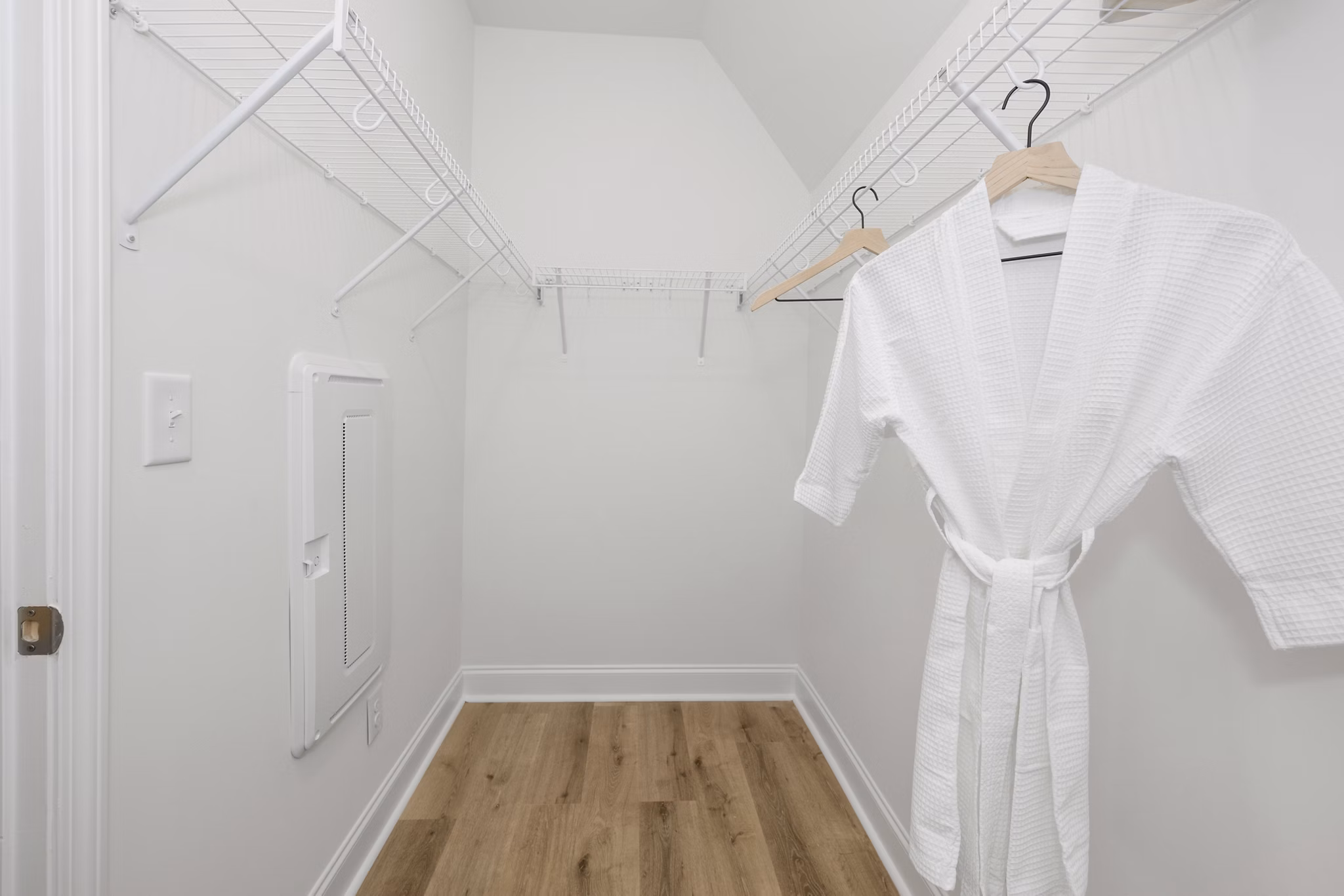 Modern laundry room with energy-efficient appliances at Oak Lake Townhomes Apartments