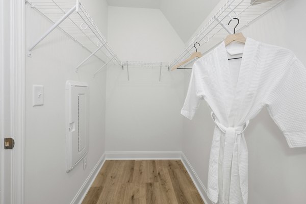 Modern laundry room with energy-efficient appliances at Oak Lake Townhomes Apartments