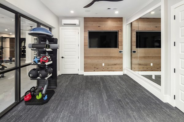 fitness center at The Dalton by Alta Apartments 