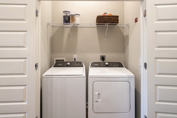 laundry facility at The Dalton by Alta Apartments 