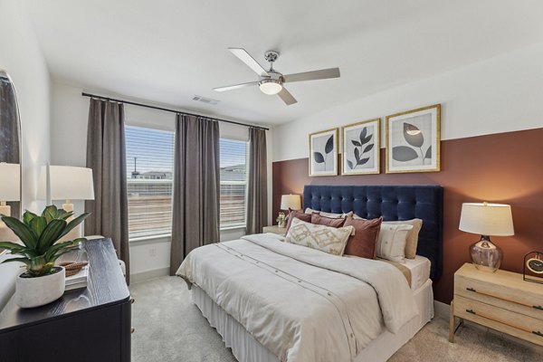 Bedroom with elegant design and natural light at Alta Grandway Apartments