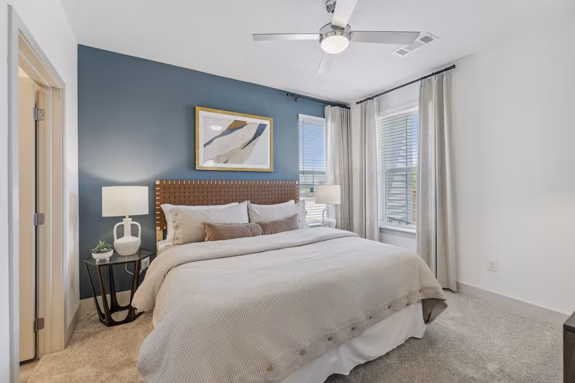 Cozy bedroom with stylish decor at Alta Grandway Apartments luxury living