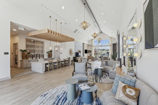 Modern clubhouse featuring sleek furnishings and community spaces at Alta Grandway Apartments