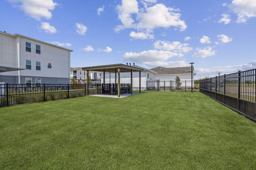 Dos Park: Scenic recreational park at Alta Grandway Apartments featuring walking trails and picnic areas