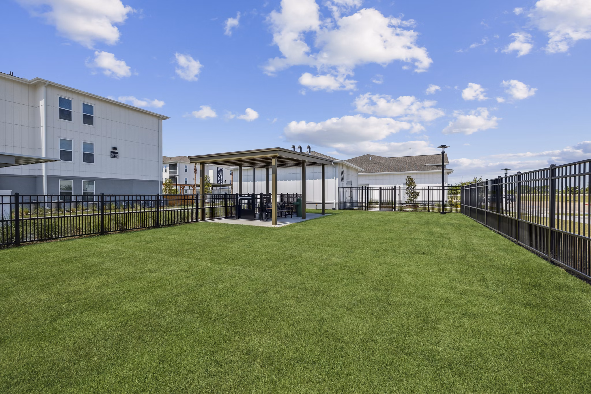 Dos Park: Scenic recreational park at Alta Grandway Apartments featuring walking trails and picnic areas