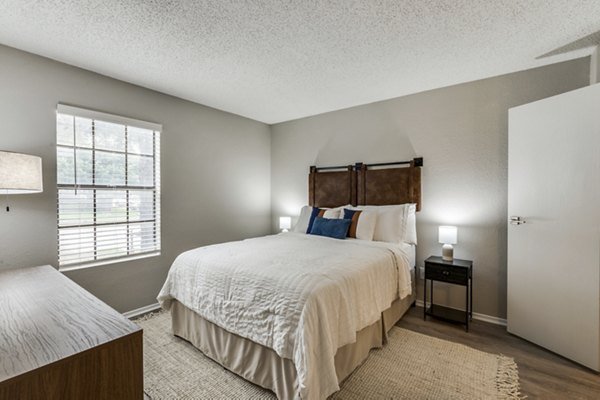 Cozy bedroom with modern decor in Wood Hollow Apartments