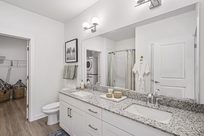 Elegant bathroom with modern fixtures at The Lacy at South Main Apartments