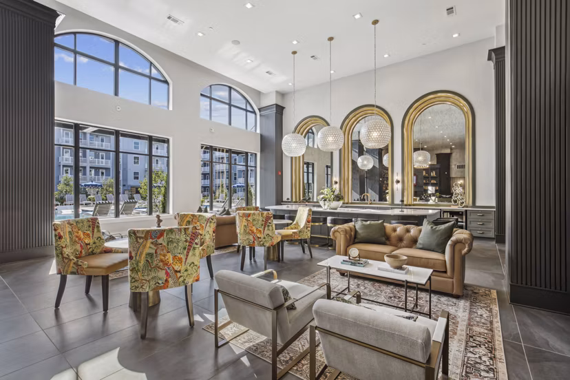 Luxury clubhouse with stylish seating and decor at The Lacy at South Main Apartments