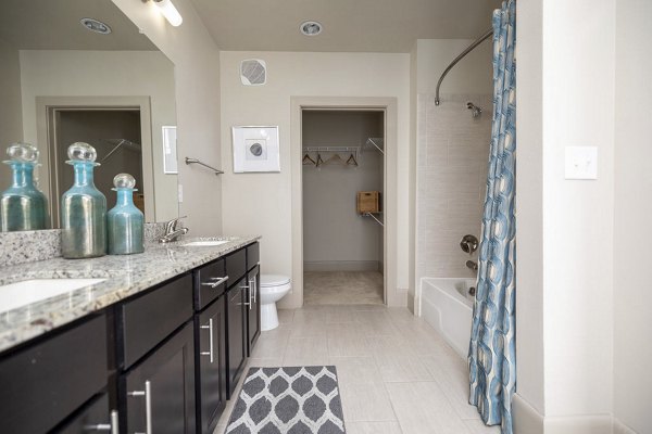 Modern bathroom with stylish fixtures at Regency Park Apartments, a luxury apartment community by Greystar