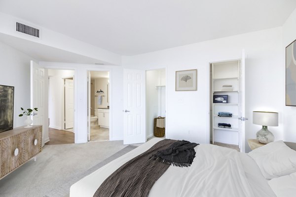 Bedroom featuring elegant decor and large windows at Marlowe Apartments, a luxury living space in a sought-after Greystar property