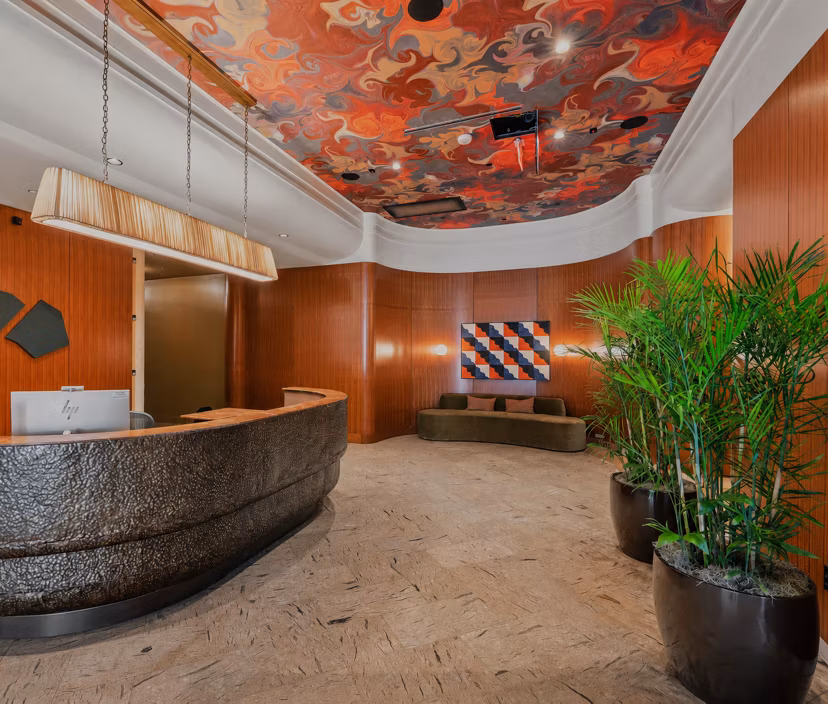 Elegant clubhouse with modern design at Marlowe Apartments, offering luxury amenities for residents to relax and socialize