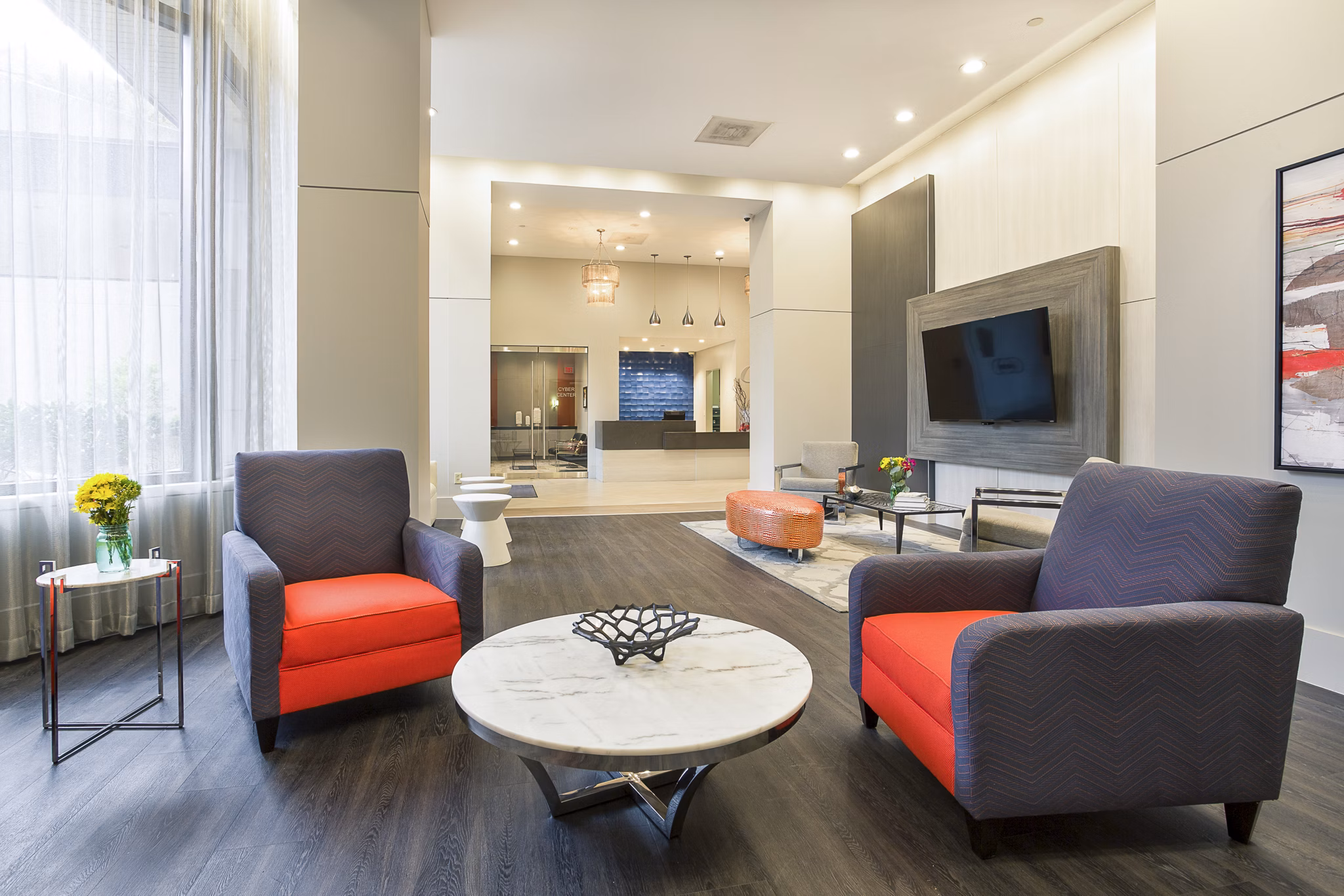 Elegant clubhouse with modern design at Marlowe Apartments, offering luxury amenities for residents to relax and socialize