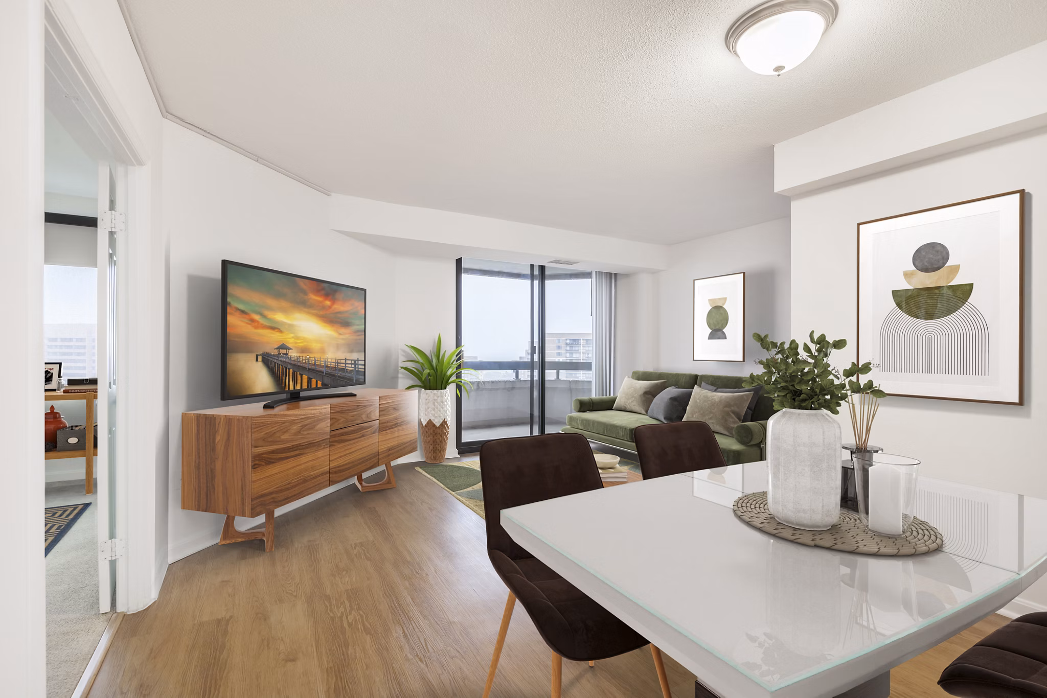Dining room with modern furniture and pendant lighting at Marlowe Apartments