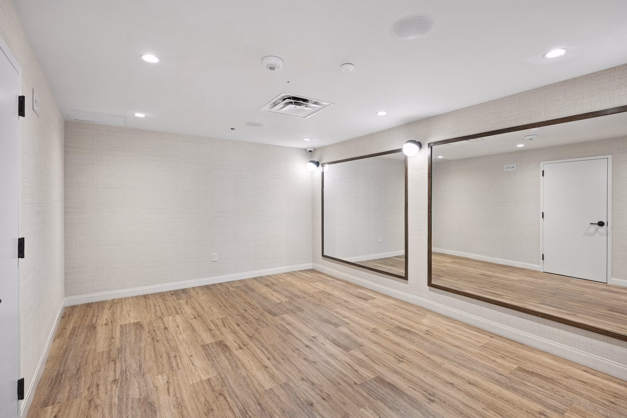 fitness center at Huxley National Landing Apartments